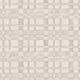 Detail of wallpaper in a large-scale checked pattern in shades of cream and tan.