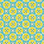Detail of wallpaper in a floral lattice print in yellow, pink, blue and white.