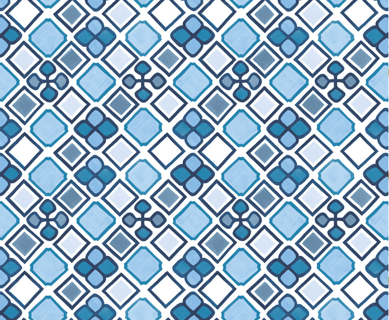 Detail of fabric in a geometric diamond and floral print in shades of blue, navy and white.