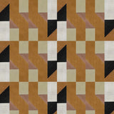 Detail of wallpaper in a geometric grid print in shades of rust, yellow and gray on a cream field.