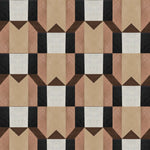 Detail of wallpaper in a geometric grid print in shades of pink, brown and gray on a white field.