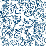 Detail of fabric in a painterly seashell print in navy on a white field.
