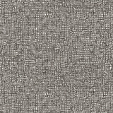 Detail of fabric in a textural wicker pattern in mottled dark brown on a white field.