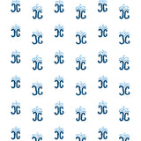 Detail of fabric in an abstract shape print in blue and navy on a white field.