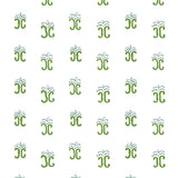 Detail of wallpaper in an abstract shape print in green, blue and navy on a white field.