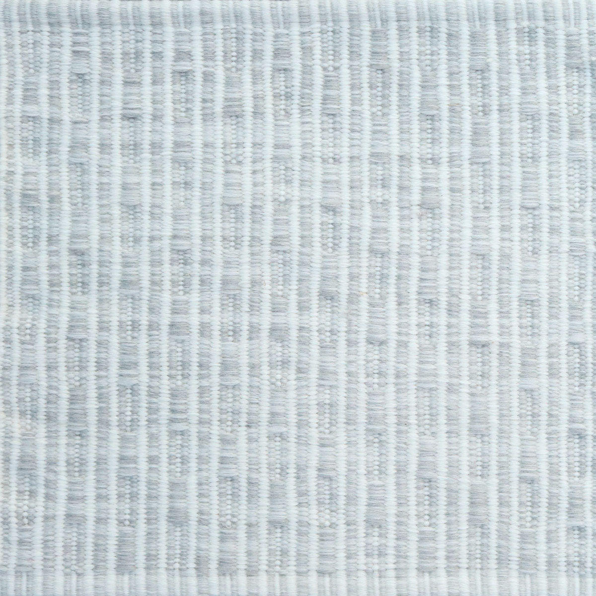 Flatweave rug in a solid and dashed stripe in cream on a pale grey field