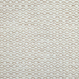 Flatweave rug in a small scale zigzag dot stripe in cream on a warm beige field.