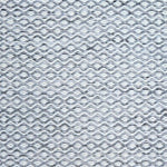 Flatweave rug in a small scale zigzag dot stripe in cream on a heather charcoal field.
