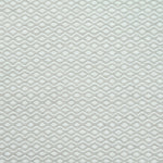 Flatweave rug in a small scale zigzag dot stripe in cream on a pale ecru field.