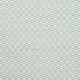 Flatweave rug in a small scale zigzag dot stripe in cream on a pale ecru field.