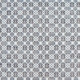 Flatweave rug in a small scale decorative lattice design in cream on a slate grey field