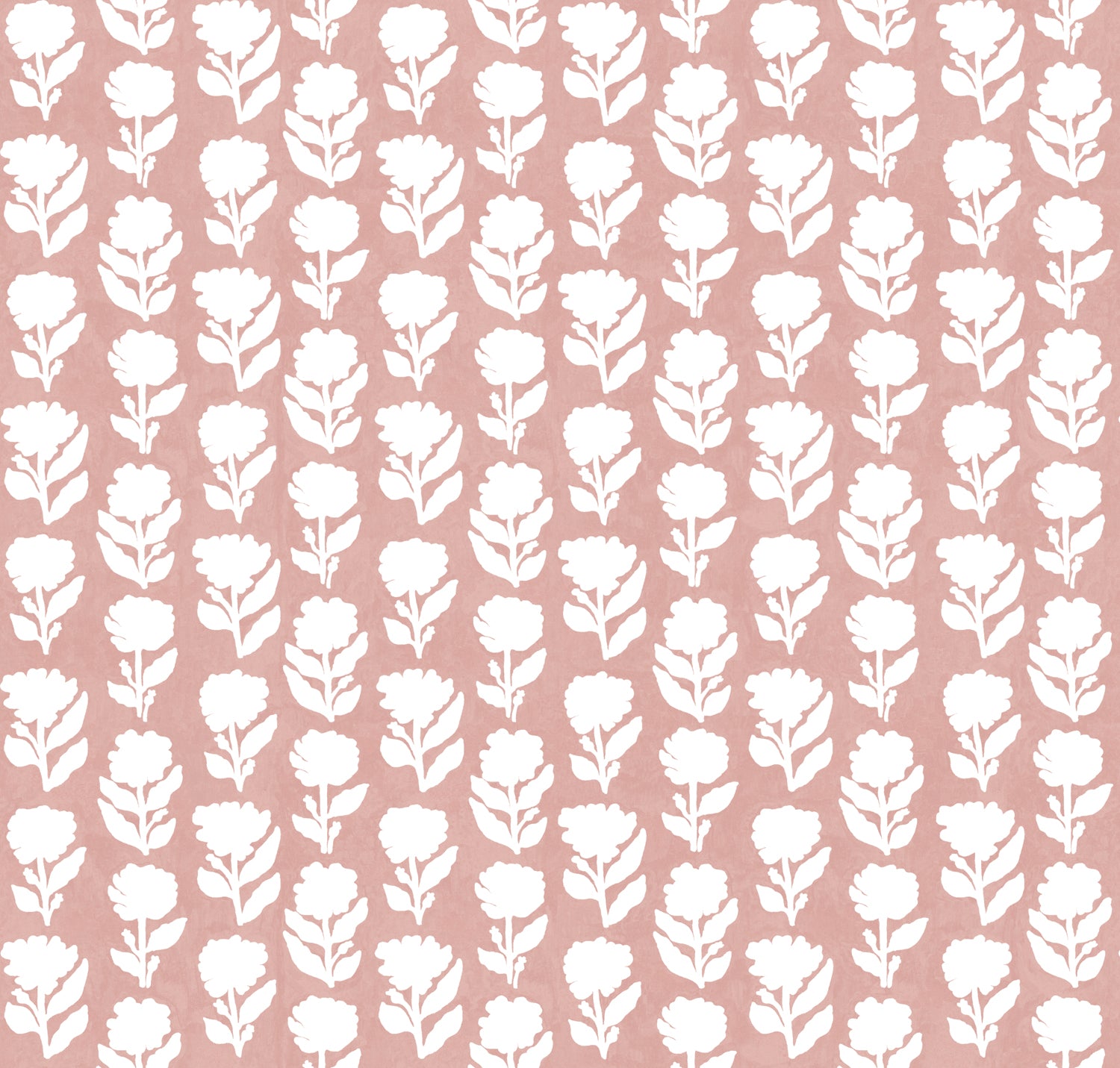 Detail of fabric in a classic floral silhouette print in cream on a pink field