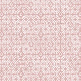 Detail of wallpaper in a gridded damask print in white on a light pink field.