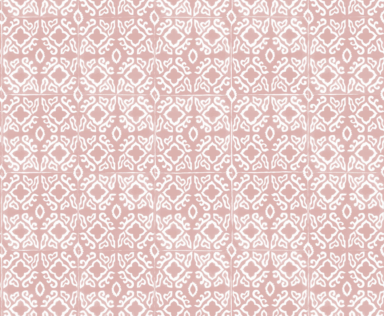 Detail of fabric in a gridded damask print in white on a light pink field.