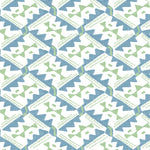 Detail of wallpaper in painterly diamond print in blue and green on a white field.