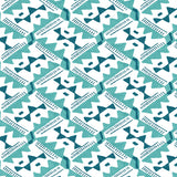 Detail of wallpaper in painterly diamond print in blue and turquoise on a white field.