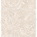 Detail of wallpaper in a painterly botanical print in white and light pink on a cream field.