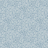Detail of wallpaper in a painterly abstract print in white on a light blue field.
