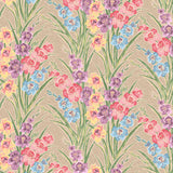 Detail of fabric in a large-scale floral pattern in a rainbow of pastels on a tan field.