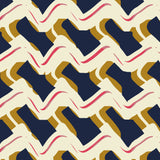 Detail of wallpaper in an abstract shape print in shades of mustard, gray, pink and cream.