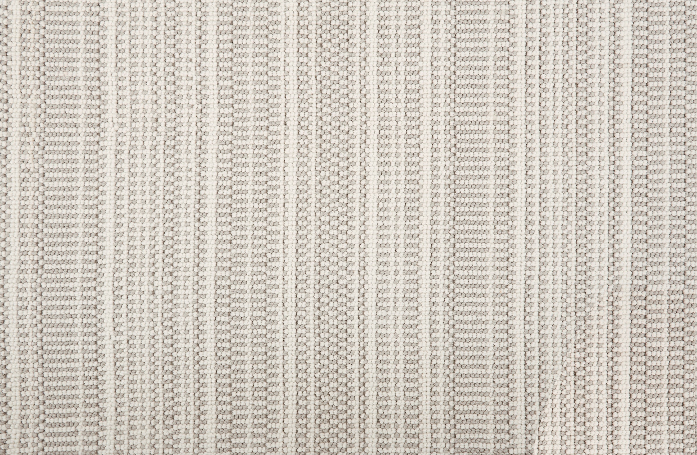 Broadloom carpet in  textural stripe design in white and grey.
