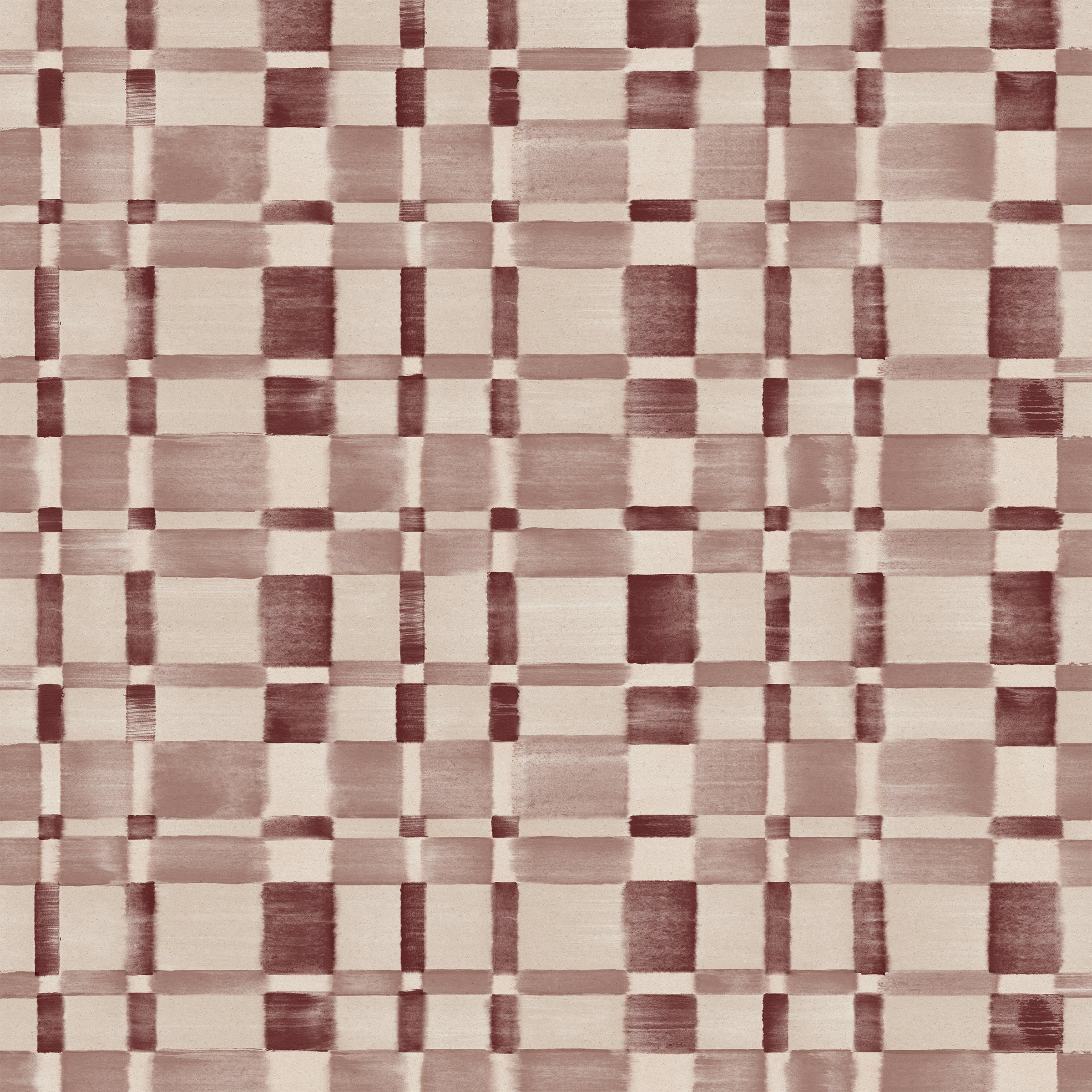 Detail of fabric in a large-scale checked pattern in shades of wine purple and beige. 