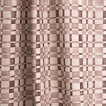 Gently draped fabric in a large-scale checked pattern in shades of wine purple and beige. 