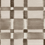 Detail of wallpaper in a large-scale checked pattern in shades of charcoal and pale grey.
