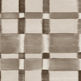 Detail of wallpaper in a large-scale checked pattern in shades of charcoal and pale grey.