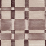 Detail of wallpaper in a large-scale checked pattern in shades of wine purple and beige.