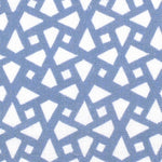 Detail of fabric in a geometric lattice print in blue on a white field.