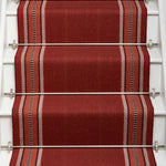 Striped flatweave runner in red on white staircase