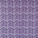 Detail of fabric in a dense leaf print in shades of purple on a purple field.