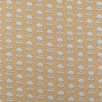 Detail of fabric in a repeating thistle print in cream and rust on an orange field.