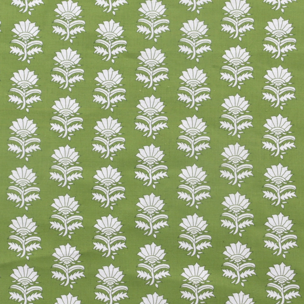 Detail of fabric in a repeating thistle print in white and green on a green field.