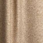 Gently draped fabric in a textural wicker pattern in warm brown on a white field. 