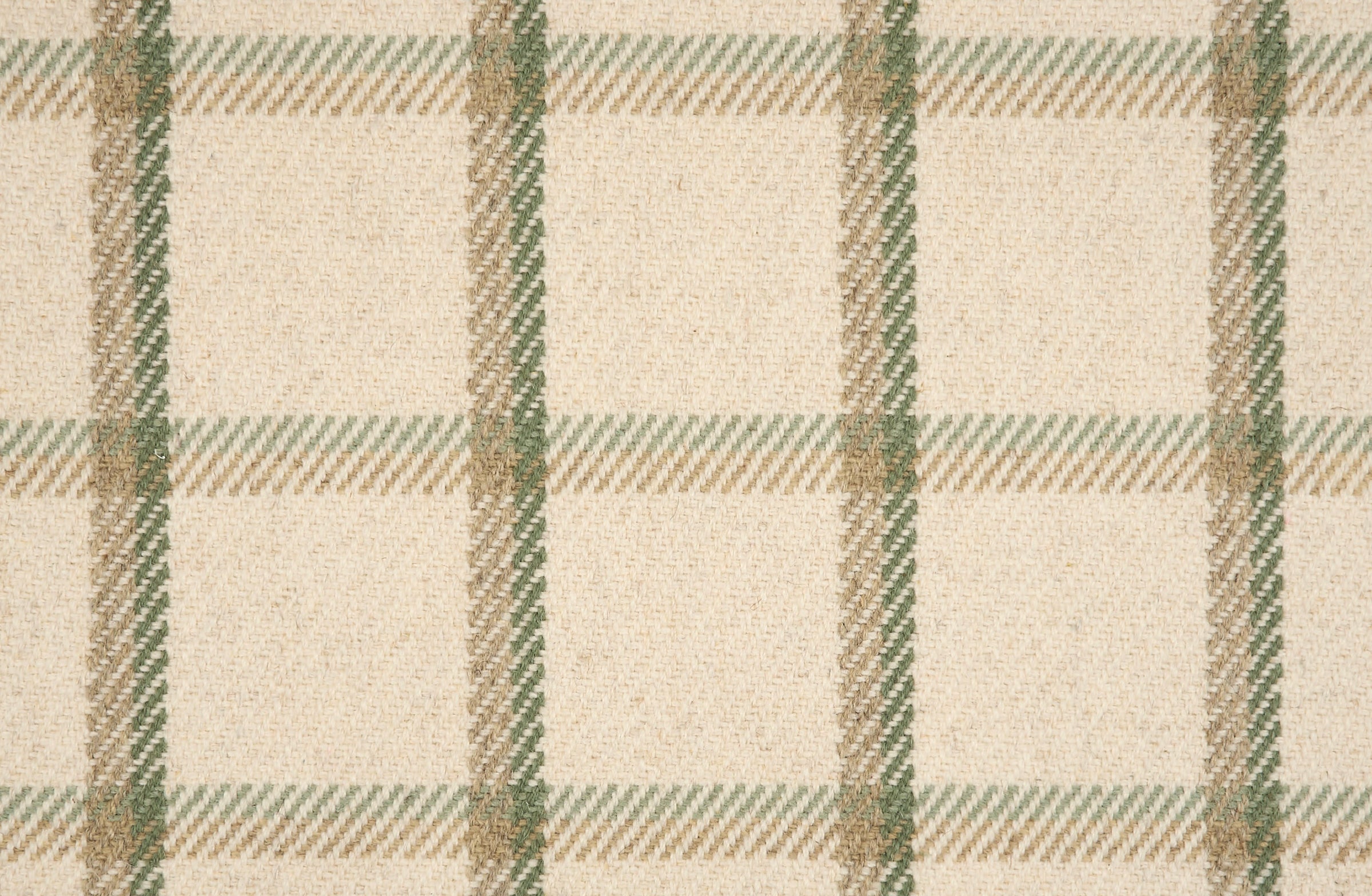Broadloom carpet in a windowpane plaid in green and tan on cream. 