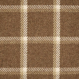 Broadloom carpet in a windowpane plaid in tan and cream on brown.