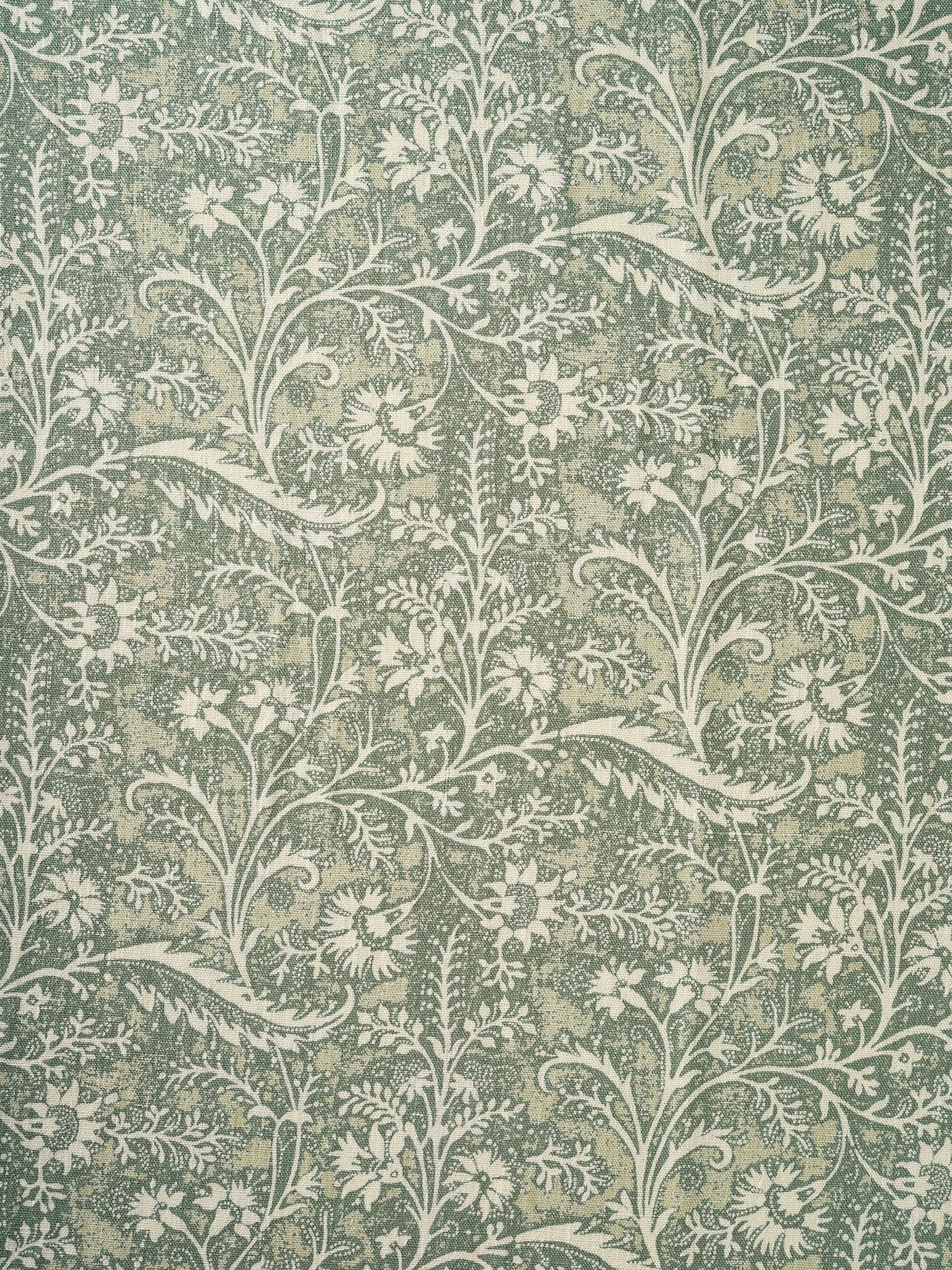 A close-up of a repeating floral and vine pattern in muted sage green and off-white.