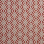 Textile with red zigzag pattern on beige background