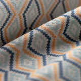 Close-up of fabric with blue and yellow geometric pattern