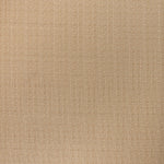 printed linen fabric in a detailed geometric pattern in cream on a camel field.