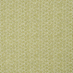 Detail of a linen fabric in a detailed geometric pattern in white on a chartreuse field.