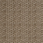 Detail of a linen fabric in a detailed geometric pattern in white on a dark brown field.