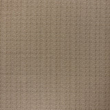 printed linen fabric in a detailed geometric pattern in white on a dark brown field.