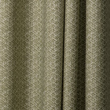 Draped printed fabric in a detailed geometric pattern in white on an olive field.