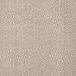 Detail of a linen fabric in a detailed geometric pattern in white on a light pink field.