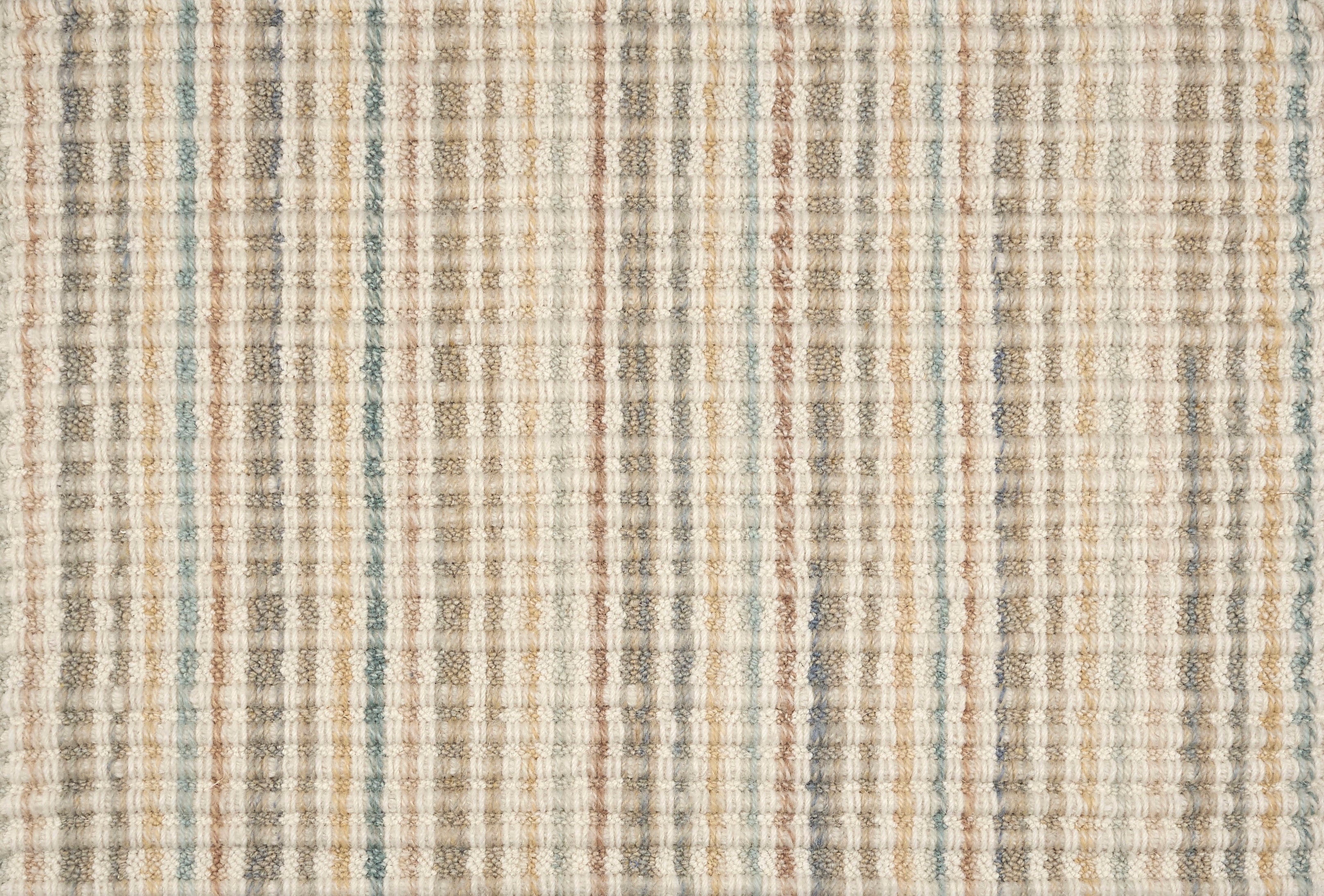 Broadloom carpet in textured stripe in striated taupe, brown, tan and cream.