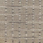 Broadloom carpet with raised gridded plaid in shades of grey and cream on an oatmeal ground. 