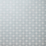Detail of wallpaper in a geometric damask print in cream on a light blue field.